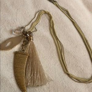 Long layered gold-themed necklace
